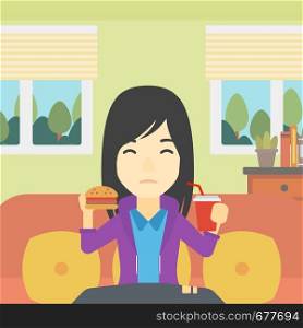 An asian young woman sitting on a sofa while eating hamburger and drinking soda on the background of living room. Vector flat design illustration. Square layout.. Woman eating hamburger vector illustration.