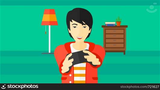 An enthusiastic asian man with gamepad in hands on a living room background vector flat design illustration. Horizontal layout.. Man playing video game.