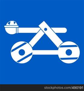 Ancient wooden catapult icon white isolated on blue background vector illustration. Ancient wooden catapult icon white