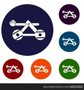 Ancient wooden catapult icons set in flat circle reb, blue and green color for web. Ancient wooden catapult icons set