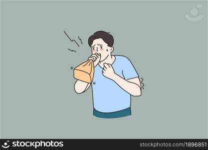 Anxious young man breathe in paper bug suffer from panic attack feel distressed worried. Unhappy male struggle with emotional nervous disorder. Mental health problem. Flat vector illustration.. Anxious man breathe suffer from panic attack