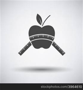 Apple with measure tape icon on gray background with round shadow. Vector illustration.