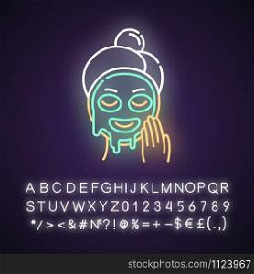 Applying liquid mask neon light icon. Skin care procedure. Facial beauty treatment. Dermatology, cosmetics, makeup. Glowing sign with alphabet, numbers and symbols. Vector isolated illustration