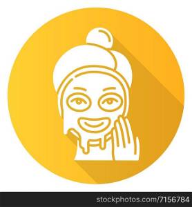 Applying liquid mask yellow flat design long shadow glyph icon. Skin care procedure. Facial beauty treatment. Face product for lifting and exfoliating effect. Makeup. Vector silhouette illustration