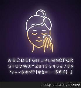 Applying moisturizer neon light icon. Skincare procedure. Cleansing effect for healthy skin. Makeup removal. Dermatology. Glowing sign with alphabet, numbers and symbols. Vector isolated illustration