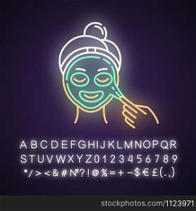 Applying peel-off mask neon light icon. Skin care procedure. Facial beauty treatment. Dermatology, cosmetics, makeup. Glowing sign with alphabet, numbers and symbols. Vector isolated illustration