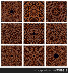 Arabic seamless floral patterns with set of orange arabesque ornaments with flowers, leaves and geometric ethnic motifs on dark blue background. Tile and textile print design. Arabic seamless floral pattern set for tile design
