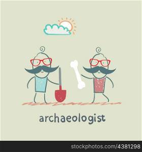 archaeologist holding a shovel and another archaeologist has bone