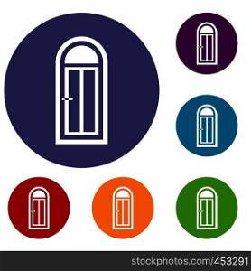 Arched wooden door with glass icons set in flat circle reb, blue and green color for web. Arched wooden door with glass icons set