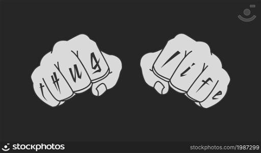 Arms with Thug Life tattoo on fingers. Clenched fists chalk illustration isolated on blackboard. Arms with Thug Life tattoo. Chalk on blackboard
