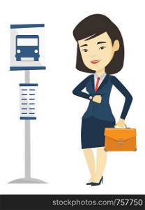 Asian business woman waiting at the bus stop. Young business woman standing at the bus stop. Woman looking at her watch at the bus stop. Vector flat design illustration isolated on white background.. Woman waiting at the bus stop vector illustration.