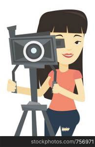 Asian cameraman looking through movie camera on a tripod. Young cameraman with professional video camera. Female cameraman taking a video. Vector flat design illustration isolated on white background.. Cameraman with movie camera on tripod.