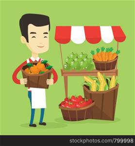 Asian greengrocer standing near stall with fruits and vegetables. Greengrocer standing near market stall. Greengrocer holding basket with fruits. Vector flat design illustration. Square layout.. Greengrocer with fruits and vegetables.