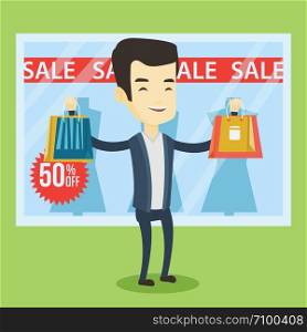 Asian man with shopping bags standing in front of clothes shop with sale sign. Cheerful man holding shopping bags in front of storefront with text sale. Vector flat design illustration. Square layout.. Man shopping on sale vector illustration.