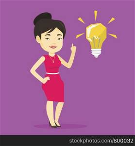Asian student pointing her finger up at the idea light bulb. Young excited student with bright idea bulb. Smart smiling student having a great idea. Vector flat design illustration. Square layout.. Student pointing at idea bulb vector illustration