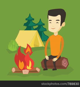 Asian travelling man sitting near a campfire at a campsite. Young travelling man sitting on a log near a campfire. Tourist relaxing near campfire. Vector flat design illustration. Square layout.. Man sitting on log near campfire in the camping.