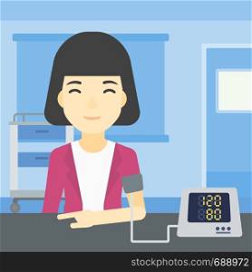Asian woman checking blood pressure with digital blood pressure meter. Woman taking care of her health and measuring blood pressure in hospital room. Vector flat design illustration. Square layout.. Blood pressure measurement vector illustration.
