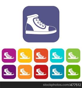 Athletic shoe icons set vector illustration in flat style in colors red, blue, green, and other. Athletic shoe icons set