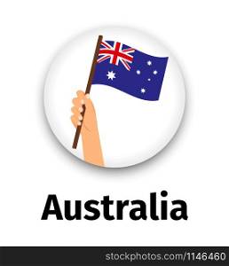 Australia flag in hand, round icon with shadow isolated on white. Human hand holding flag, vector illustration. Australia flag in hand, round icon