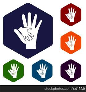 Baby and mother hand icons set hexagon isolated vector illustration. Baby and mother hand icons set hexagon