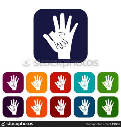 Baby and mother hand icons set vector illustration in flat style In colors red, blue, green and other. Baby and mother hand icons set flat