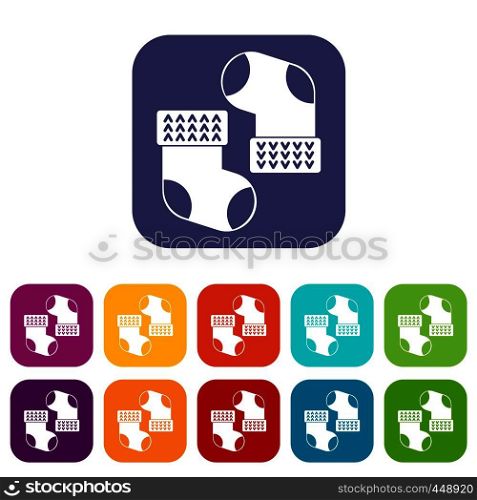 Baby socks icons set vector illustration in flat style In colors red, blue, green and other. Baby socks icons set flat