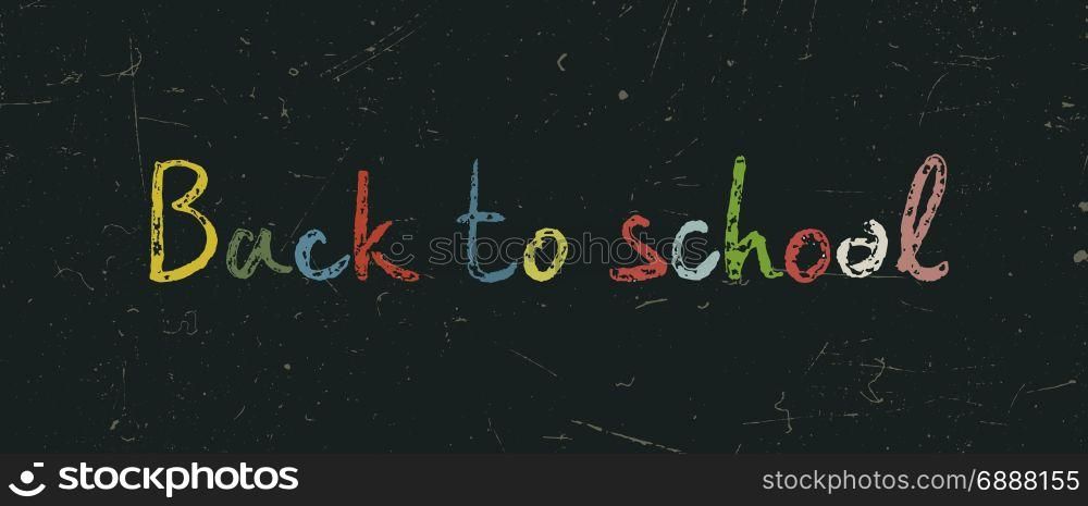 Back to school. Back to school text on blackboard.