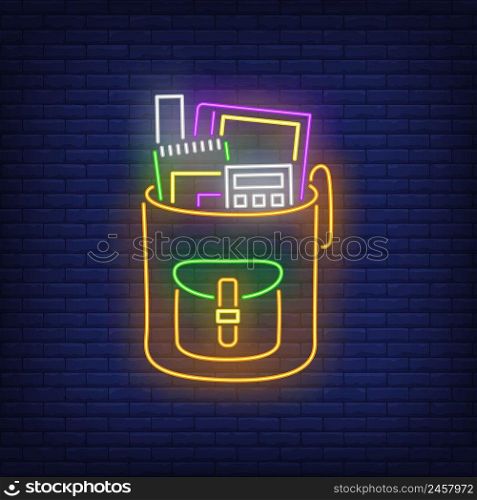 Backpack with calculator neon sign. School, pupil, stationery. Vector illustration in neon style for topics like studies, student life, education