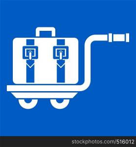 Baggage cart icon white isolated on blue background vector illustration. Baggage cart icon white