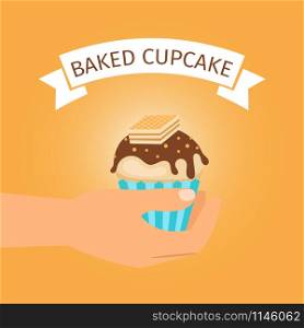 Baked yellow cupcake gift in hand, vector illustration. Baked yellow cupcake gift