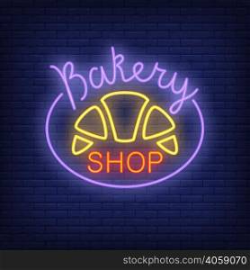 Bakery shop neon sign. Bright croissant on dark blue brick wall. Night bright advertisement. Vector illustration in neon style for restaurant and candy bar