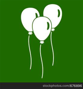 Balloons icon white isolated on green background. Vector illustration. Balloons icon green
