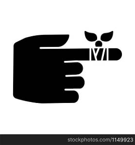 Bandaging glyph icon. Hurt finger. Hand injury. Arm pain help. First aid. Medical procedure. Healthcare. Minor injury. Silhouette symbol. Negative space. Vector isolated illustration