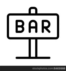 Bar sign board mounted on street side.