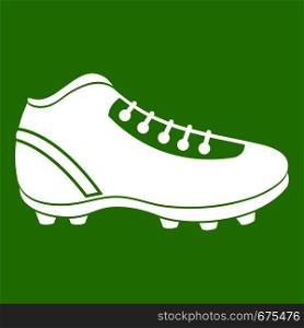 Baseball cleat icon white isolated on green background. Vector illustration. Baseball cleat icon green