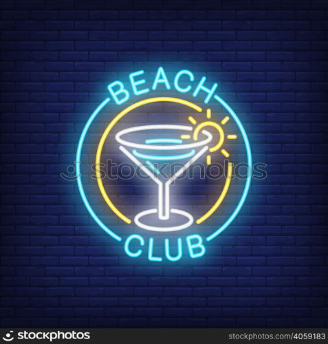 Beach club lettering and cocktail in circle. Neon sign on brick background. Bar, restaurant, martini. Nightclub concept. For topics like vacation, resort, nightlife