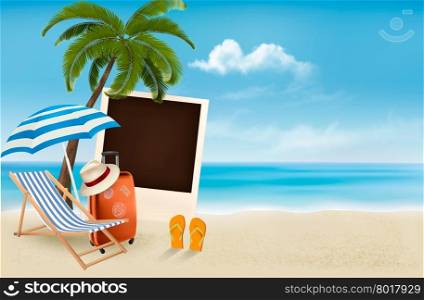 Beach with a palm tree, a photograph and a beach chair.