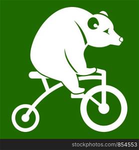 Bear on a bike icon white isolated on green background. Vector illustration. Bear on a bike icon green