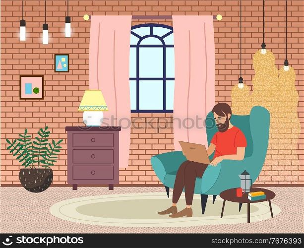 Bearded man sitting on the armchair in living room interior and correspondence surfing the Internet. Male character communicating through network on the laptop. Freelance, work from home concept. Bearded man sitting on the armchair in living room interior and correspondence surfing the Internet