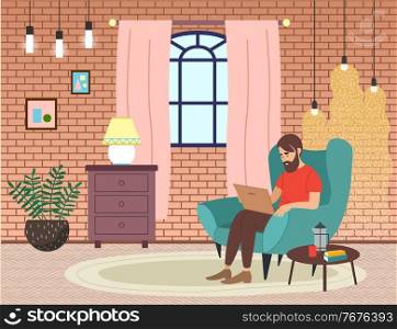 Bearded man sitting on the armchair in living room interior and correspondence surfing the Internet. Male character communicating through network on the laptop. Freelance, work from home concept. Bearded man sitting on the armchair in living room interior and correspondence surfing the Internet