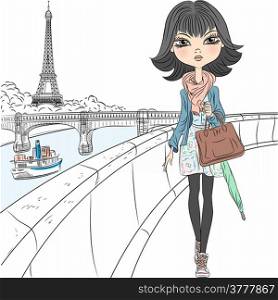 Beautiful fashion girl in a scarf with an umbrella and a bag walking on the waterfront overlooking the Eiffel Tower in Paris
