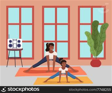 Beautiful young mother and her charming little daughter are smiling while doing yoga together at gym. Happy woman and cheerful girl do stretching, sports exercises. Family leads an active lifestyle. Beautiful young woman and her charming little daughter are smiling while doing yoga together at gym