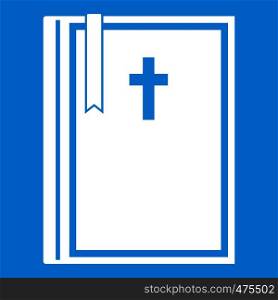Bible icon white isolated on blue background vector illustration. Bible icon white