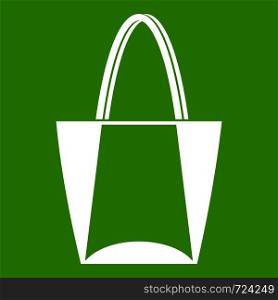 Big bag icon white isolated on green background. Vector illustration. Big bag icon green