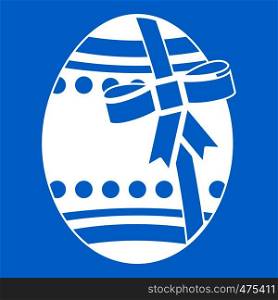 Big easter egg icon white isolated on blue background vector illustration. Big easter egg icon white