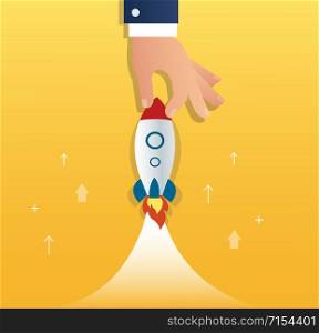big hand holding a rocket, startup business concept