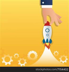 big hand holding a rocket, startup business concept