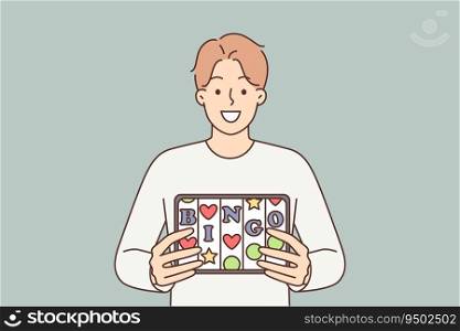 Bingo application in electronic tablet of man offering to visit online casino or try luck in lottery. Guy with smile demonstrates gadget with inscription bingo and slot machine cells. Bingo application in electronic tablet of man offering to visit online casino or try luck in lottery