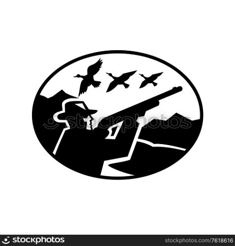 Black and white illustration of a hunter aiming shooting ducks with rifle viewed from the side set inside oval shape with mountains in the background done in retro style on isolated background. . Duck Hunter Aiming Shooting Ducks Mountains Oval Retro Black and White