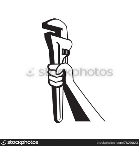Black and white illustration of a plumber hand holding adjustable pipe wrench or monkey wrench viewed from the side on isolated white background done in retro style. . Hand of Plumber Holding Up Pipe Wrench Retro Black and White